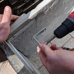 Coyote Ready-To-Assemble 5 Ft. Outdoor Kitchen Island For Natural Gas Grill And Access Door - Gray Stacked Stone -Kitchen BBQ Sale Coyote Ready To Assemble 3 Ft Outdoor Kitchen Island with 18 Inch Electric Grill and Access Door Gray Stacked Stone RTAC E3F SG Installation 1