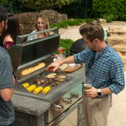 Coyote Ready-To-Assemble 6 Ft. Outdoor Kitchen Island For Natural Gas Grill And Access Door - Gray Stacked Stone -Kitchen BBQ Sale Coyote Ready To Assemble 6 Ft Outdoor Kitchen Island Gray Stacked Stone RTAC G6 SG Lifestyle 1 1