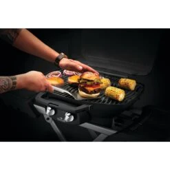 Napoleon TravelQ 3-Piece Stainless Steel BBQ Toolset -Kitchen BBQ Sale Low Res JPG 70051 Travel Q Tool Set InUse SpatulawBurger