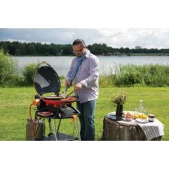 Napoleon TravelQ 2225 Portable Propane Gas Grill - Orange 20 Napoleon TravelQ 2225 Portable Propane Gas Grill - Orange -Kitchen BBQ Sale Low Res JPG TQ2225 lifestyle 07