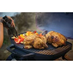 Napoleon TravelQ 285 Portable Propane Gas Grill With Griddle - Red -Kitchen BBQ Sale Low Res JPG TQ285 Lifestyle Camping Chicken with tongs