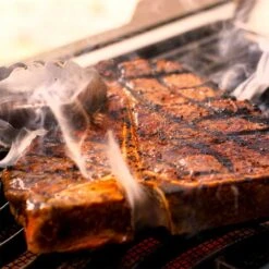 Napoleon Prestige 665 RSIB Propane With Infrared Side & Rear Burners - Stainless Steel -Kitchen BBQ Sale Napoleon Prestige 665 RSIB infrared rear burner and infrared side burner searing steak on the high heat infrared side burner