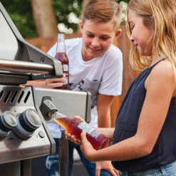 Napoleon Rogue SE 425 RSIB Propane Gas Grill With Infrared Rear & Side Burner - Stainless Steel -Kitchen BBQ Sale Napoleon Rogue SE 425 RSIB Propane Gas Grill with Infrared Rear and Side Burner Stainless Steel Bottle Opener Lifestyle