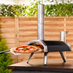Ooni Fyra 12 Wood-Fired Pellet Powered Portable Outdoor Pizza Oven -Kitchen BBQ Sale Ooni Fyra 12 Wood Fired Pellet Powered Portable Outdoor Pizza Oven UU P0AD00 Lifestyle