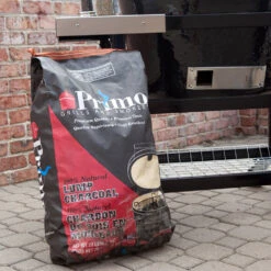 Primo 20lb. 100 Percent Natural Lump Charcoal -Kitchen BBQ Sale Primo 20 Pound 100 Percent Natural Lump Charcoal 608 Lifestyle With Grill